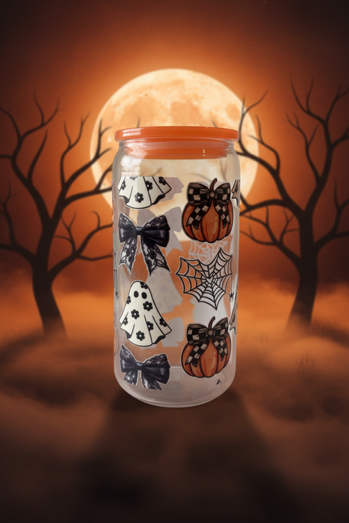 Halloween ghosts and pumpkins glass can cup with spooky orange and black background