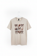 Football and bows graphic tee on white studio background