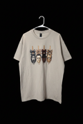 Sand horror mask cake pops graphic tee on black studio background